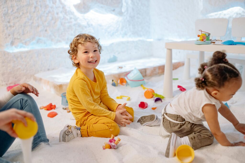 pexels-photo-8435803-8435803 Children enjoying playful activities indoors, showcasing joy and creativity.